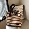 2025 Bolso de Hombro Nuevo Bolso de Mujer de Moda Más Fácil de Combinar Moda Casual Estilo Coreano Gran Capacidad Portátil Bolso de Lona Rayado