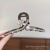 Nuevo Clip de Garra de Flor y Perla de Lujo Ligero Trabajo Pesado Temperamento Suave Clip de Tiburón de Lujo Ligero de Alta Gama Exquisito Accesorio para el Moño del Cabello