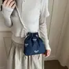 Nova bolsa de lona jeans, design de laço feminino, bolsa tipo balde doce e versátil, grande capacidade, bolsa de ombro casual com pérolas