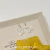 Pendientes de Pétalo con Concha Blanca Frescos y Minimalistas, Pendientes Exquisitos de Gama Alta de Nicho Que Hacen que los Rostros Cuadrados y Redondos Luzcan Más Delgados, Venta al por Mayor