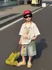 Camiseta Nueva de Verano de Dibujos Animados Suelta de Manga Corta, Transpirable y Suave, 2026 Ban Chuan Nueva de Verano de Manga Corta Versátil y Elegante