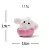 Micro-paisaje creativo lindo brisa de primavera conejito blanco figura decoración DIY accesorio de caja sorpresa adorno de escritorio