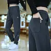 Pantalones Casuales de Sarga para Hombres y Mujeres Primavera y Otoño Pantalones Deportivos Sueltos Versátiles de Moda Tendencia Pantalones de Chándal Pernera Ajustada Hacia Abajo Dobladillo Harem