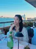 Ropa del mismo estilo de Song Hye-kyo, nueva camisa larga de manga larga suelta y ligera de primavera-verano, camisa protectora solar, camisa blanca de rayas verticales para mujer