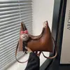 Bolso de Hombro Retro Coreano con Forma de Media Luna 2025 Invierno Estética Personalizada Diseño Simple de Nicho Bolso de Hombro Cruzado