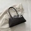 Bolsa Feminina Simples Retrô 2026 Outono Novo Estilo Elegante Temperamento Bolsa de Ombro de Axila Moda para o Dia a Dia Bolsa de Mão