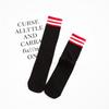 Nueva versión coreana de los calcetines estilo académico calcetines de felpa para mujer otoño e invierno comodín dos barras caña larga a rayas personalidad popular al por mayor