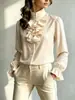 Camisa vintage con cuello alto fruncido, tela texturizada plisada, exquisita tapeta de botones, mangas largas holgadas