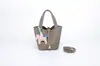 Bolso cruzado para mujer, Bolso de hombro versátil de paja, Bolso tipo cubo de nicho de lujo ligero para mujer, Estudiante