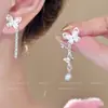 Aretes Asimétricos de Mariposa con Borla y Piedra Ojo de Gato para Mujer, Estilo Súper Hada, Diseño Único y Elegante, Aretes Impresionantes