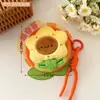 Nuevo diseño original: Colgante de monedero de peluche de flor de girasol, bolsa pequeña de almacenamiento para auriculares de niñas, cables de datos y joyas