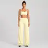 Conjunto de roupa fitness transfronteiriço, com um design traseiro estiloso, um top esportivo de gola halter e calças de yoga de secagem rápida, adequado para corrida ao ar livre, ciclismo e Pilates.