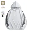 Sudadera con capucha de tres rayas para hombre y mujer, de primavera y otoño, a rayas, marca de moda, top holgado de moda, camiseta básica de manga larga para pareja