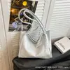 Bolso cruzado retro de gran capacidad para mujer 2026 nuevo de moda simple versátil bolso de hombro con sensación de alta gama para ir al trabajo bolso tote