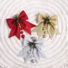 Venta al por mayor de fábrica Accesorios de Navidad Adornos forma tridimensional Adornos de pared Lazo Colgantes de árbol de Navidad Suministros de decoración