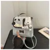 Mochila cruzada 2026 Otoño Nuevo Estilo Coreano para Viajes Cotidianos Linda Estilo Académico Dibujos Animados Mochila Pequeña Bolso Portátil de Nicho