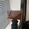 Bolso de mujer estilo sobre de moda transfronterizo, bolso de hombro moderno estilo coreano, bolso cruzado, bolso de axila, estilo casual, 2026, diseño de cadena simple, elegante para mujer