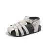 Novedades Verano 2026 Unisex Moda Infantil Sandalias Cubrepie Estilo Coreano Moda Zapatos de Playa Suela Blanda Venta al por Mayor Individual Artículo Popular