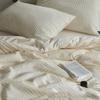 Misterioso algodón Seersucker de dopamina juego de cuatro piezas jacquard corrugado de algodón funda de edredón ropa de cama Nantong