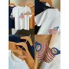 Linda y juvenil camiseta coreana de estilo holgado con bordado adelgazante, top casual de manga corta de dibujos animados para mujer, nuevo modelo de verano H072001