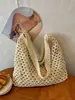 Bolsa de Palha Casual de Grande Capacidade para Mulheres 2026 Novo Estilo Bolsa de Ombro Vazada Estilo Preguiçoso Fashionável Elegante Bolsa de Praia para Férias