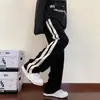 Pantalones Casuales de Retazos Rayados para Hombre Otoño Nueva Llegada Estilo Hong Kong Modernos Holgados de Pierna Recta Pantalones de Pierna Ancha para Jóvenes