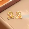 Fábrica de Joyería Jiehao Pendientes de Circonita Texturizada, Moda de Gama Alta, Pendientes de Diseño de Nicho y Personalizados, Accesorios de Moda de Yiwu