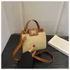 Bolso Cruzado de Hombro Único Color Sólido para la Noche 2026 Nuevo Bolso Elegante para Mujer con Cierre Retro y Diseño Tejido de Paja en la Axila
