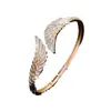 Suministro Transfronterizo: Pulsera Vintage Estilo Palacio con Ala de Pluma y Circonita Microincrustada, Elegante y Graciosa Pulsera para Mujer al por Mayor