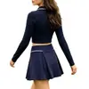 Camisa polo casual de manga comprida feminina de novo estilo transfronteiriça com cintura alta e design de cores contrastantes, adequada para golfe e tênis, e apresentando uma saia embutida para evitar exposição.