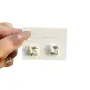 Pendientes de Aro de Plata Sencillos para Mujer, Modernos y de Alta Gama, con un Ambiente de Lujo Ligero, Adecuados para el Uso Diario, Diseño de Goteo de Aceite, Rodeados de Pendientes de Botón