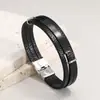 Moda europea y americana todo partido pulsera tejida multicapa para hombre personalidad brillante pulsera negra de moda para hombre pulsera de cuero simple
