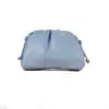 Bolsa Plissada de Couro Macio Feminina 2024 Nova Bolsa Clutch Simples Bolsa de Festa Cor Sólida Textura Bolsa de Ombro Transversal Bolsa de Clipe