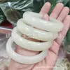 Venta al por mayor de fábrica material de Mongolia Exterior pulsera Daquan jade Hetian jade plano para pulsera de jade pulsera de jade en vivo suministro
