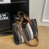 Bolsa Tote de Viagem Grande Capacidade para Exportação Transfronteiriça 2025 Nova Cor Contrastante Lona Alça Larga para Ombro Transversal Bolsa Popular Feminina