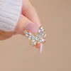 Broche de mariposa hueco con diamantes brillantes, pasador de seguridad anti-luz, decoración fija para cárdigan, bufanda