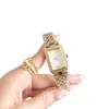 Reloj de pulsera para mujer de cuarzo, banda de acero rectangular con incrustaciones de diamantes, esfera blanca, reloj de pulsera para mujer, reloj de cuarzo al por mayor