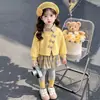 Conjunto xadrez color block com gravata borboleta estilo coreano para meninas, novo conjunto de duas peças da moda para outono e primavera de 2026 para meninas pequenas