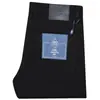 Otoño e Invierno nuevos pantalones gruesos de algodón elástico lyocell color negro oscuro para hombre, tejido anti-decoloración protección del medio ambiente, jeans de negocios para hombre
