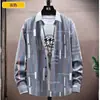 Camisa de hombre de manga larga, moderna, ajustada, juvenil, informal, a rayas, para negocios, de alta gama, para primavera y otoño