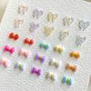 Color moño joyería para uñas moño cinta resina hielo a través exquisito viento dulce usar decoraciones para uñas al por mayor