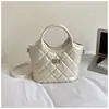 Bolso bandolera nuevo y moderno para ir al trabajo, bolso de mano, bolso de moda, bolso tipo cubo de primavera, bolso sencillo para mujer, diseño exclusivo acolchado