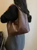 Bolso de axila tejido de PU de alta gama para mujer, nuevo bolso de axila de moda para otoño/invierno 2026, bolso tote para ir al trabajo