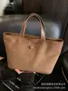 Bolso Tote de Gamuza de Gran Capacidad para Mujer 2025 Nuevo Bolso de Mano Trendy de Alta Gama para Salir a Trabajar y Bolsa para Desplazamientos