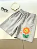 Pantalones cortos de verano para niños y niñas, pantalones casuales transpirables de cintura alta, pantalones de longitud media estampados versátiles holgados para niños