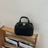 Bolsa de bowling tecida transfronteiriça, design de nicho de luxo leve, bolsa de ombro e transversal, bolsa Boston almofadada fashion