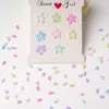 Novas e estilosas decorações de arte para unhas em formato de pétala de cristal de gelo, flores translúcidas tridimensionais de cinco pétalas, ornamentos de flores de resina multicoloridos misturados