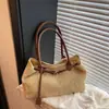 Bolsa de mano casual tejida de paja para mujer, nueva moda 2026 diseño calado, gran capacidad, bolso de axila de verano