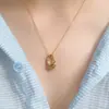 Collar y pendientes transfronterizos nuevos de acero de titanio con forma de gota irregular para niñas, diseño de nicho de lujo ligero, cadena alta para la clavícula de alta gama