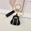 Chaveiro de bolsa tipo sachê com diamantes em toda a superfície, transfronteiriço, couro, alta qualidade, cravejado de diamantes, acessório de bolsa feminina de luxo leve, pequeno presente